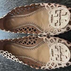 Gold fillagree Tory Burch flats.